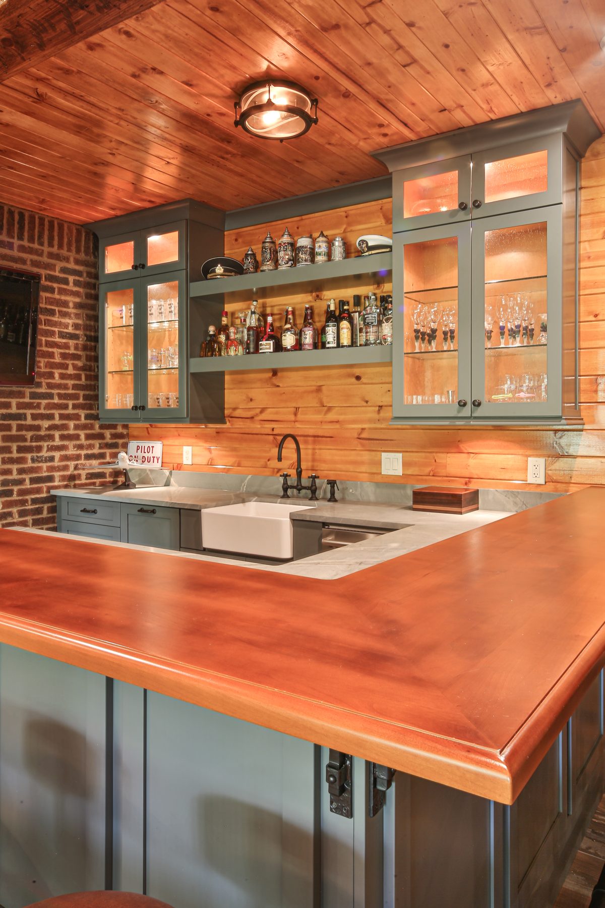 Basement Bar with Lit Glass Uppers